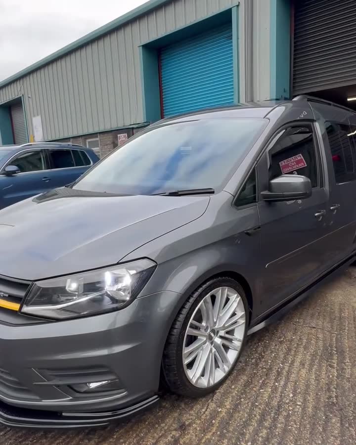 Grey VW Caddy with silver alloys after a mini valet, outside the DV Valeting unit